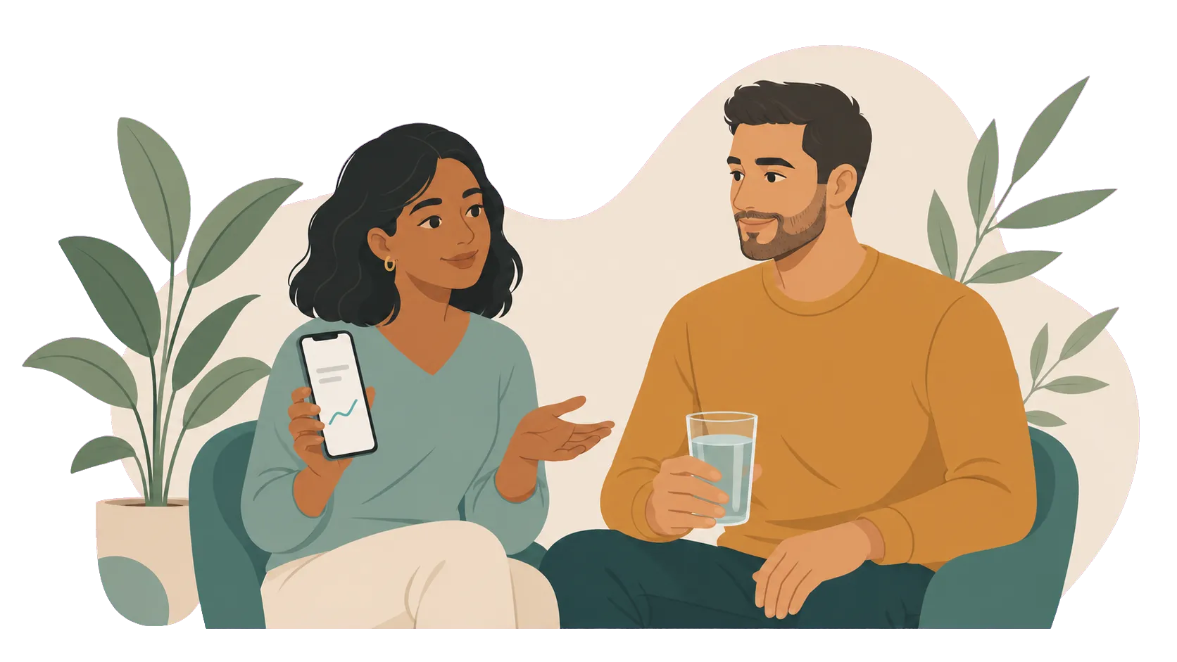 Two adults seated at home discussing health insights shown in the Know Your Labs app